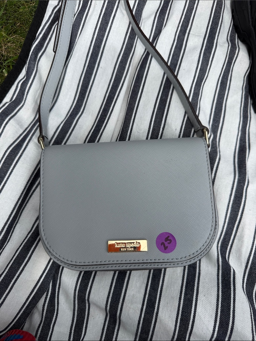 kate spade gray leather crossbody with gold logo plaque